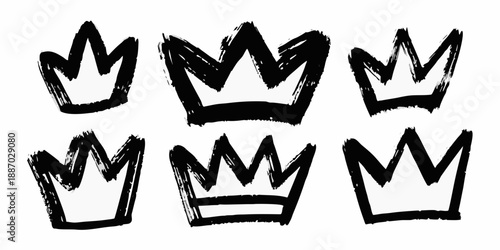 A collection of hand drawn black crowns in varying styles and arrangements