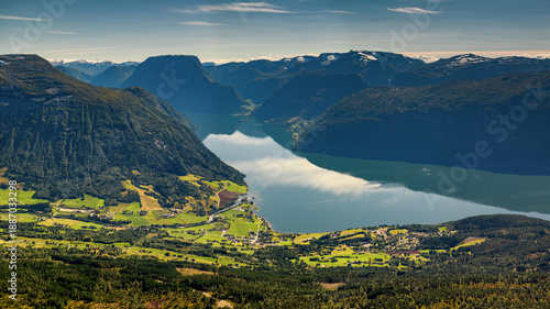drone view of the Breimsvatnet Lake and the village of Reed in central Norway