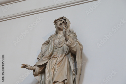 Wallpaper Mural Statue of a Woman Detail at the Mozes en Aäronkerk Church in Amsterdam, Netherlands Torontodigital.ca