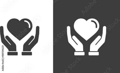 Set of two simple stylized icons depicting cupped hands gently holding and protecting a glowing heart symbol presented in contrasting black and white graphical styles
