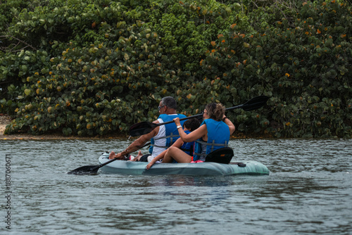 family on kayak