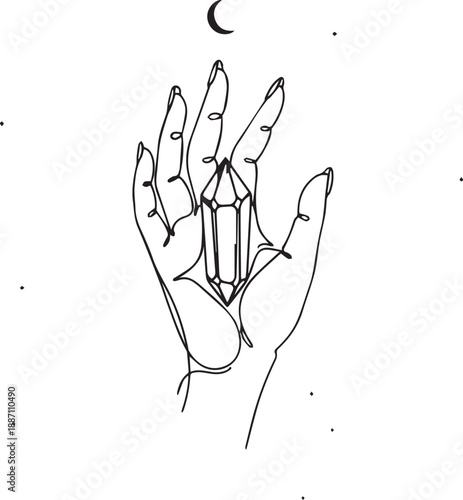 A delicate hand cradling a crystal adorned with a crescent moon and stars