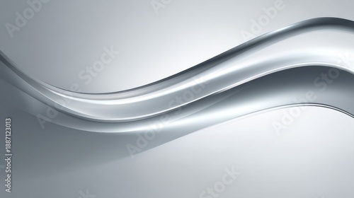 Elegant flowing curves in sleek silver tones on a smooth background