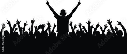 Silhouette of DJ with headphones performing on stage for excited crowd with raised hands at music festival concert party, symbolizing nightlife celebration and energetic entertainment