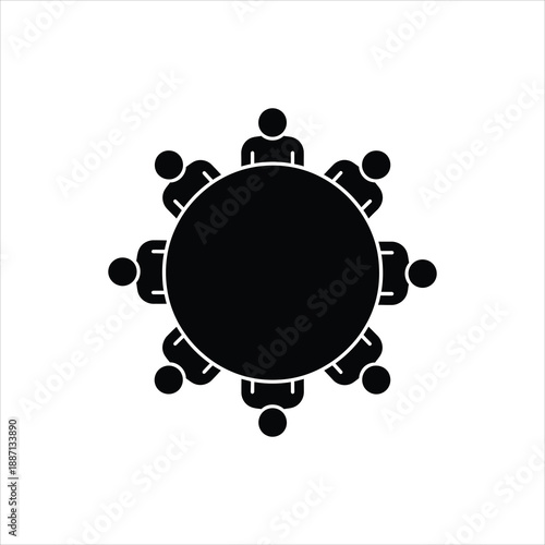 A simple black and white icon depicting people seated around a round table