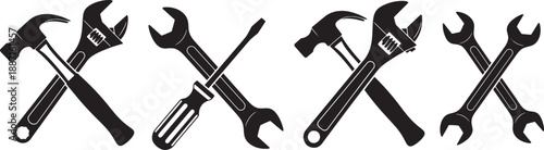 Industrial steel hammer and wrench tools isolated on a white background with artistic black and white paint splashes for building and repair