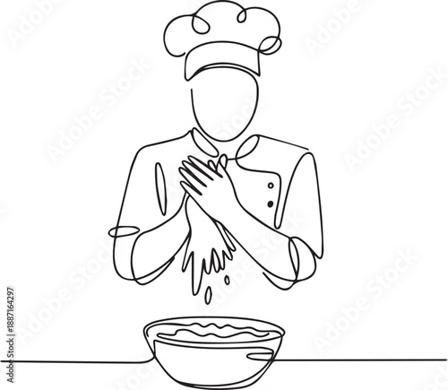 A chef prepares dough for baking in a kitchen setting from a front view