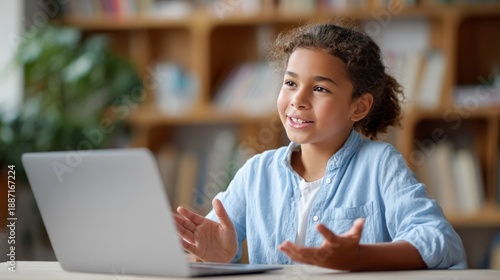Young caucasian female child engaged in online learning at home