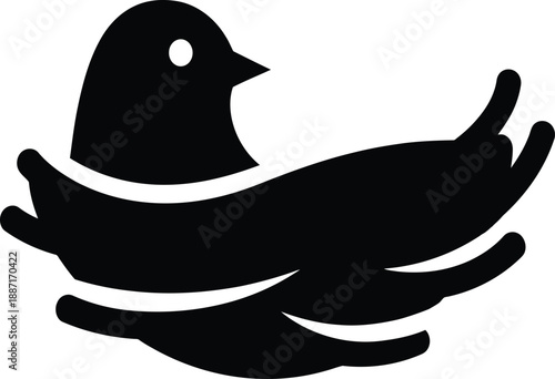 Black silhouette of a bird in flight