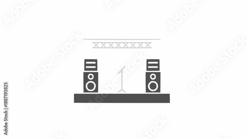 Stage setup with speakers, microphone, and lighting rig for live performance.