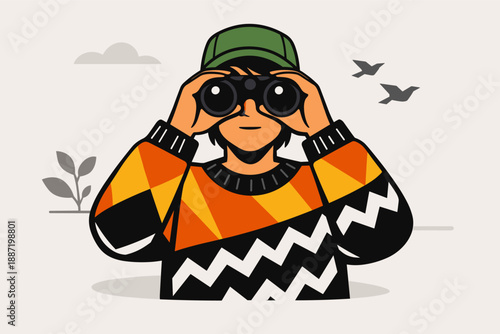 Young caucasian male observing with binoculars in nature setting