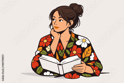 Young asian female reading in floral attire
