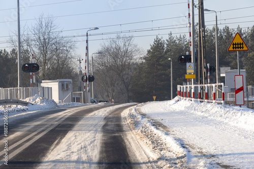 Wallpaper Mural A railway crossing in a cold, snowy winter. Poland, January Torontodigital.ca