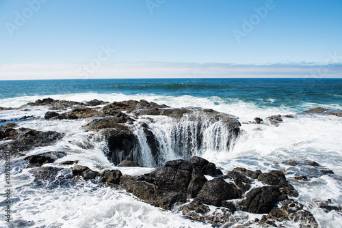 waves crashing on rocks