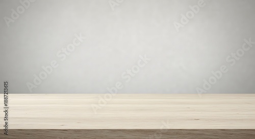 Empty wooden table surface against a softly blurred light gray background