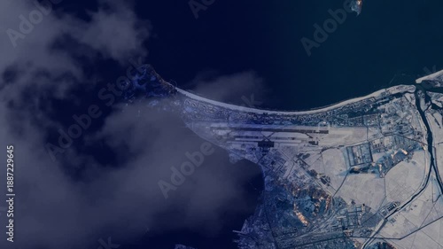 Wonsan coastal city and airport at sunrise, satellite view flying over North Korea animation based on NASA imagery