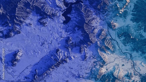 Snow covered mountain landscape at sunrise, abstract satellite view background animation based on NASA imagery
