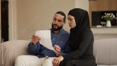 Wallpaper Mural Arab couple reading bad news letter, upset about immigration refusal notice Torontodigital.ca