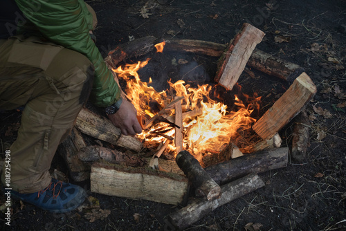 Survival course. Lighting a campfire and using a fire starter. Survival techniques.