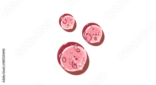 Three sliced tomatoes are arranged in a triangular formation on a white surface from a top-down viewpoint