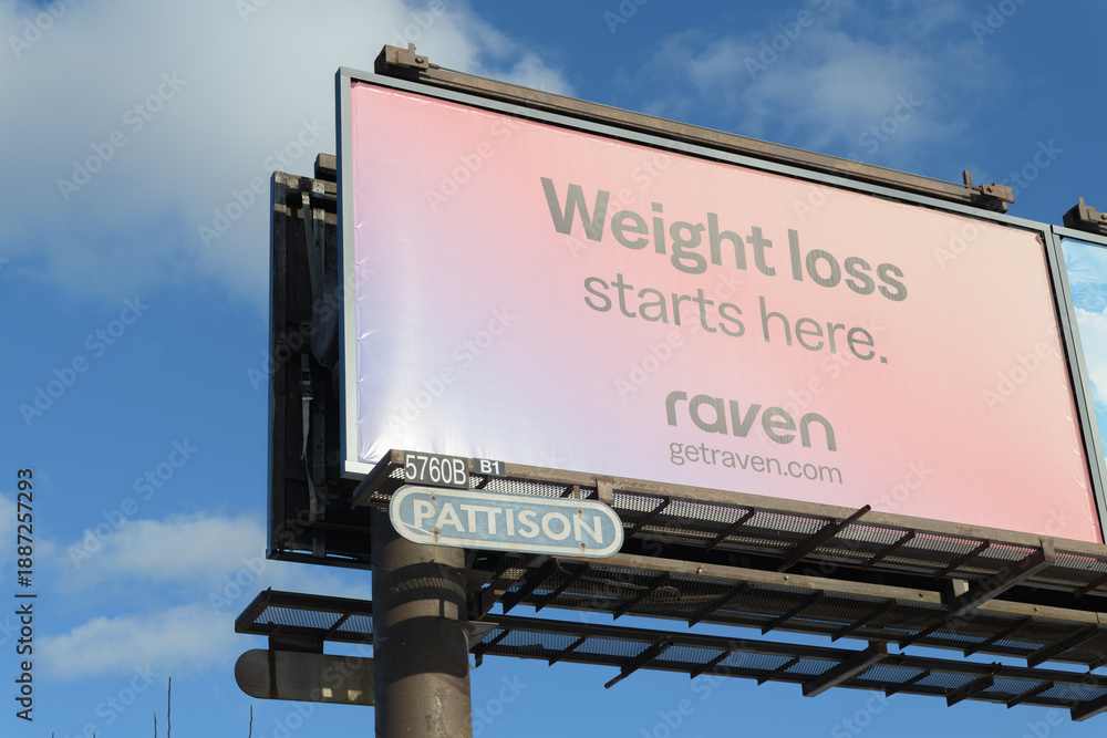 Naklejka premium roadside billboard for Raven, a non‑prescription supplement brand marketed for metabolism or appetite support, Toronto