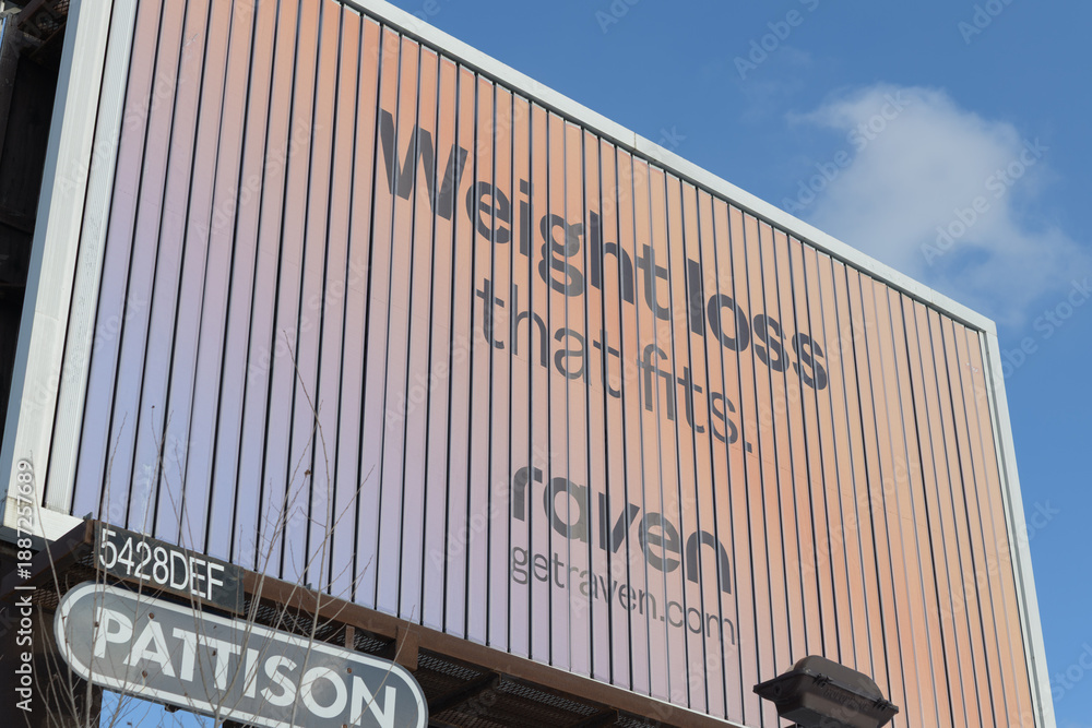Obraz premium roadside billboard for Raven, a non‑prescription supplement brand marketed for metabolism or appetite support, Toronto