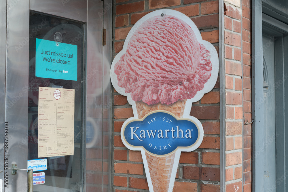 Fototapeta premium menu on the door of Avenue Diner incl ice cream cone advertising logo sign for Kawartha Dairy, 222 Davenport Rd, Toronto