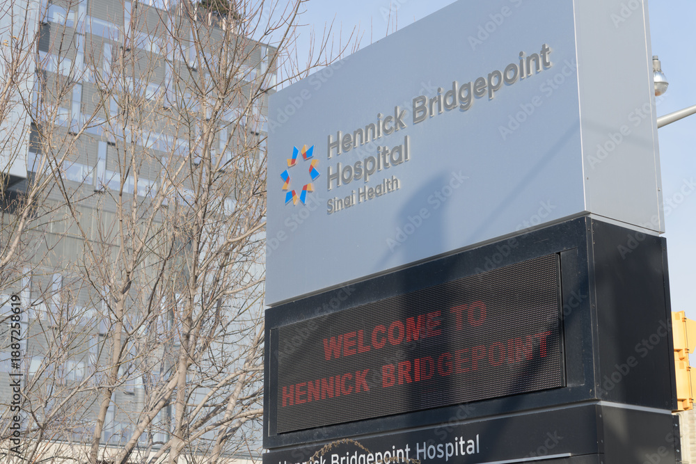 Fototapeta premium sign outside Hennick Bridgepoint Hospital at 1 Bridgepoint Dr off Gerrard St E, Toronto