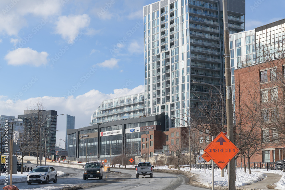 Fototapeta premium looking northwest on Eastern Av Diversion to car dealers and traffic, from Broadview Av, Toronto
