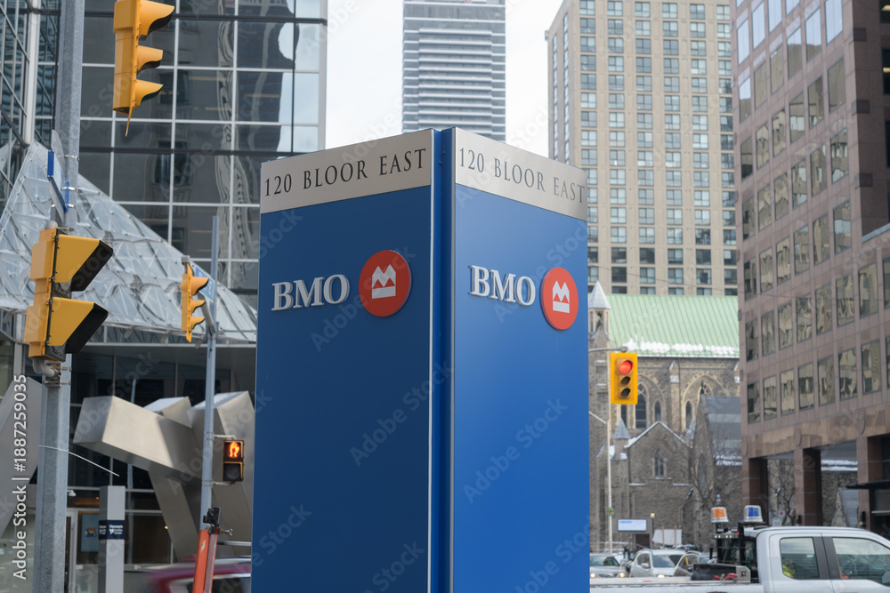 Fototapeta premium roadside sign for BMO Bank of Montreal branch at 120 Bloor St E, Toronto (looking east on Bloor E at Church St)