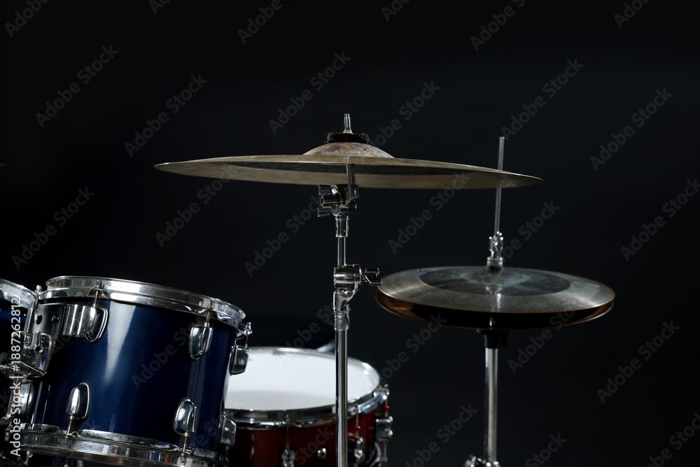 Obraz premium Drum kit. Rack toms and cymbals on black background