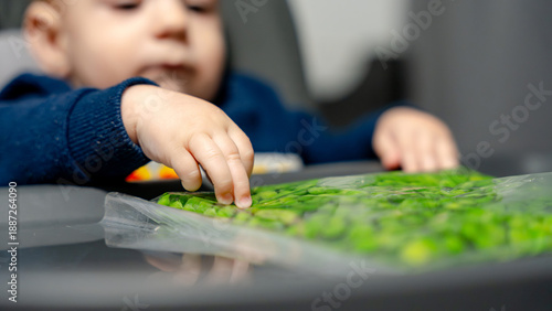 Baby sensory exploration with food for stimulation