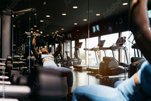 Hotel gym training with weights and cardio equipment