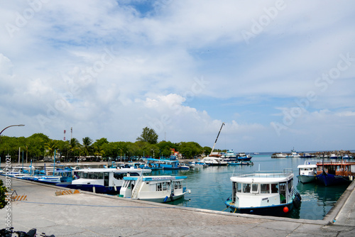 Wallpaper Mural Fuvahmulah Hafen with boats and calm water on a cloudy day in Fuvahmulah, Maldives Torontodigital.ca