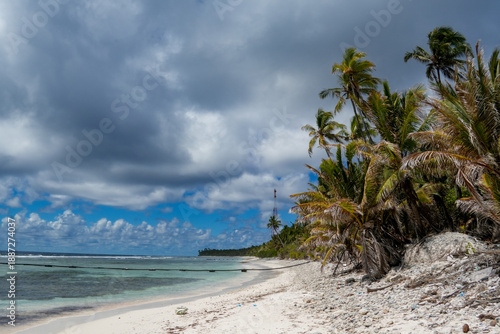 Wallpaper Mural Explore Fuvahmulah island in Maldives with palm trees and blue waters under various clouds during a sunny day Torontodigital.ca
