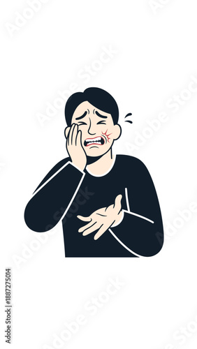 Young man experiencing toothache and holding his face in pain  