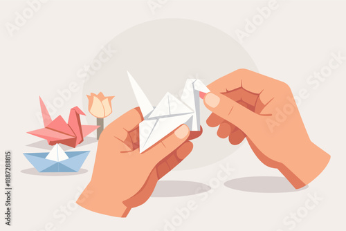 Crafting a white origami crane with hands folding paper swan