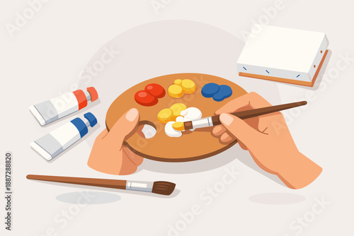 Artist mixing colors on palette with brush and paint tubes