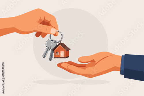 Hand giving house keychain to another hand - real estate exchange concept