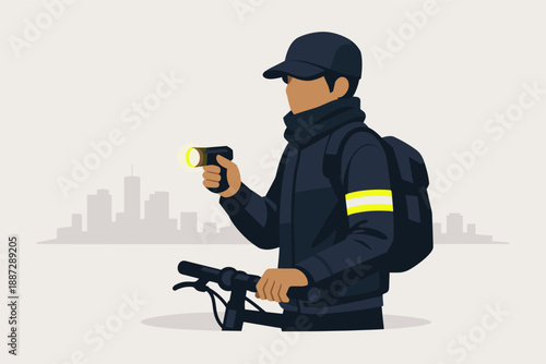 Male cyclist with flashlight in urban setting at night
