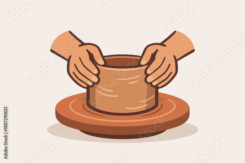 Hands shaping clay on pottery wheel