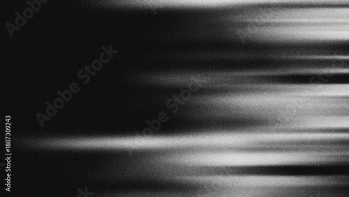Photos Black and white abstract background with heavy grain texture, featuring horizontal motion blur and dark cinematic gradients