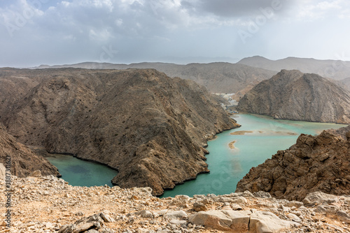 Yenkit Bay view point  in Oman. A scenic overlook in Muscat, Oman, famous for its fjord-like landscapes where mountains meet turquoise waters