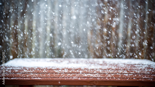 unanimity. Winter wooden surface with gentle snowfall, cold seasonal atmosphere. travel magazines, destination branding, designed for outdoor magazines and nature guides, inspires travel planning.
