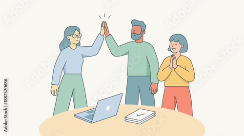 Team celebrating success with high five in modern office