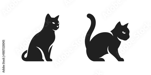 Two Black Cat Silhouettes Sitting and Crouching on White Background.
