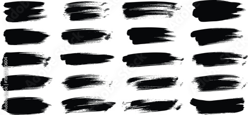 Collection of black brush strokes arranged in a grid pattern on a clean background viewed from directly above