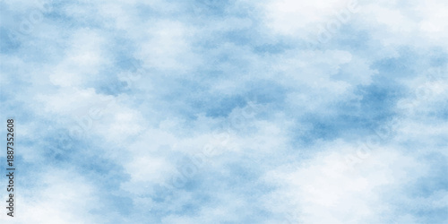 A beautiful clear blue sky background filled with bright fluffy white clouds on a sunny summer day creates a natural heaven cloudscape in the high atmosphere