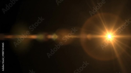 Golden Flare and Bokeh Effects Transitioning Across a Dark Screen Visual Background