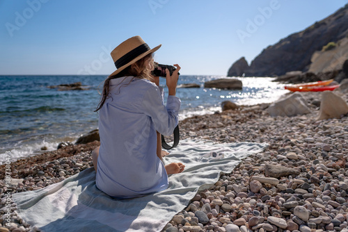 Photos Woman camera beach